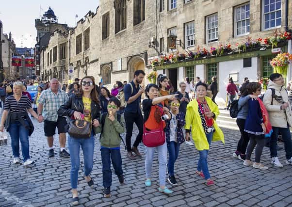 Tourists on Edinburgh's Royal Mile (Picture: Ian Rutherford)