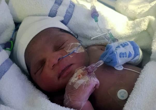 The abandoned baby found by police in a park. Picture: SWNS