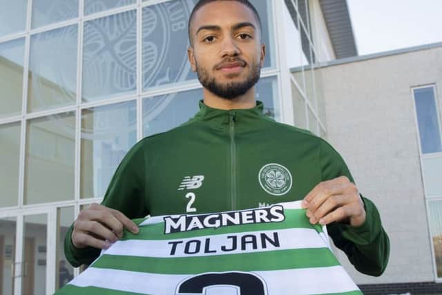 New signing Jeremy Toljan with his new Celtic jersey.