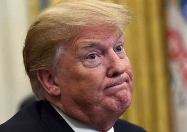 Special counsel Robert Mueller's investigation did not find evidence that Donald Trump's campaign "conspired or coordinated" with Russia to influence the 2016 presidential election, the Justice Department said. Picture: Susan Walsh/AP