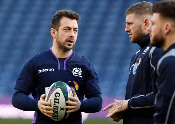 Scotland skipper Greig Laidlaw chats to stand-off Finn Russell during the captain's run at Murrayfield. Picture: Alan Harvey/SNS/SRU