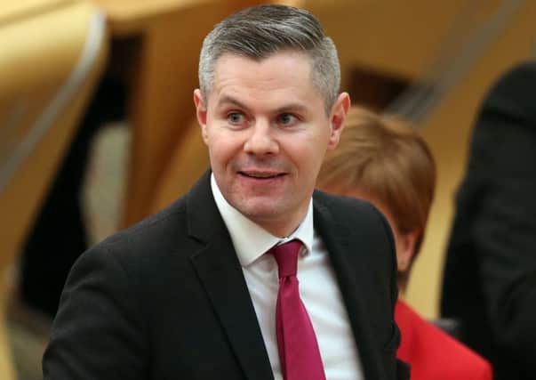 Finance Minister Derek Mackay made fun of Labour's Neil Findlay by quoting from a speech he had accidently leaked to the government. Picture: Jane Barlow/PA