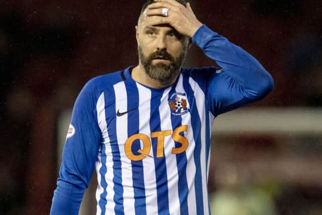 Kilmarnock's Kris Boyd has blamed Hibernian for their treatement of Neil Lennon.