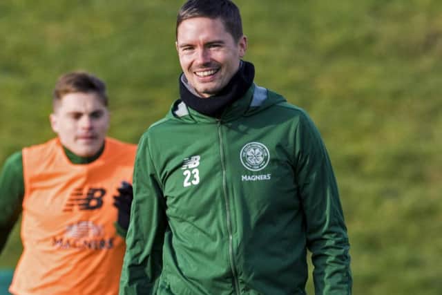 Celtic's James Forrest (L) and Mikael Lustig. Pic: SNS/Alan Harvey