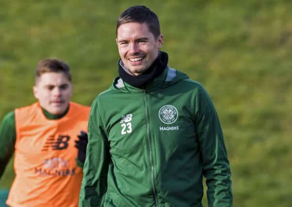 Celtic's James Forrest (L) and Mikael Lustig. Pic: SNS/Alan Harvey