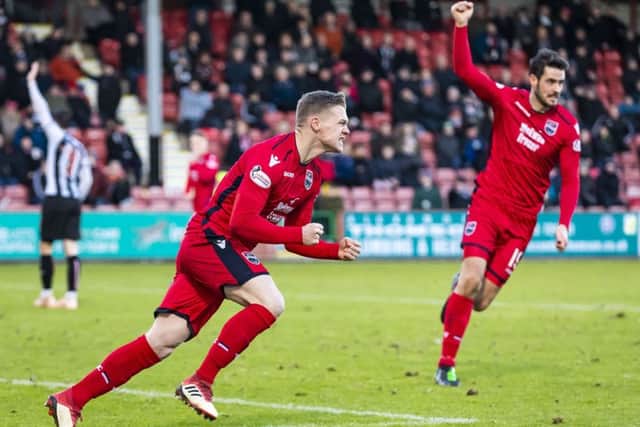 Ross County's Billy McKay celebrates after equalising. Pic: SNS/Roddy Scott