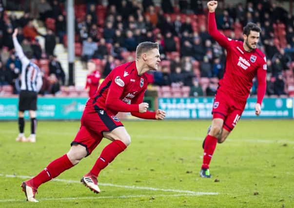 Ross County's Billy McKay celebrates after equalising. Pic: SNS/Roddy Scott