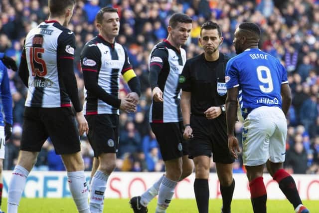 St Mirren players appeal to Andrew Dallas after Rangers were award another penalty. Picture: SNS