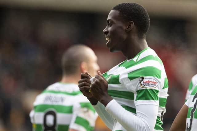 Timothy Weah celebrates after wrapping up the 2-0 victory at Celtic Park. Picture: SNS