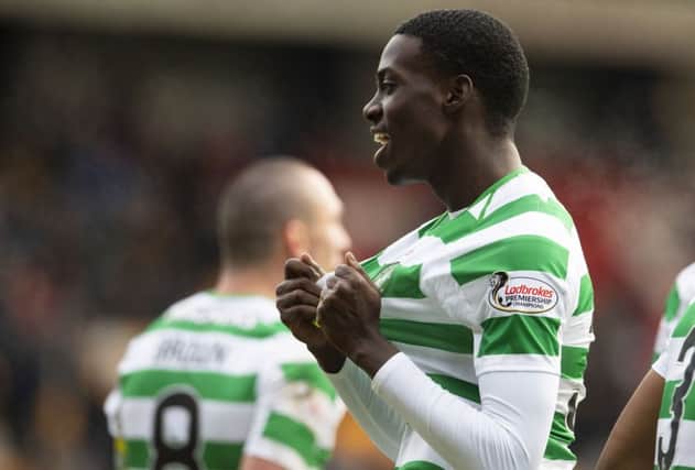 Timothy Weah celebrates after wrapping up the 2-0 victory at Celtic Park. Picture: SNS