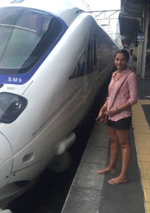 Monisha Rajesh about to board the Shinkansen to Kyoto, Japan, as part of her journey Around The World In 80 Trains