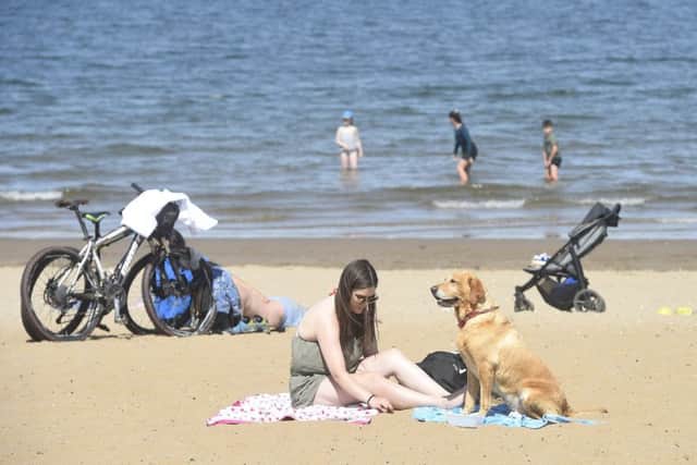 Just come back from Spain? Don't tell us about the art galleries, shops, restaurants, life-affirming experiences. Us Scots just want to know one thing: did you get nice weather?
