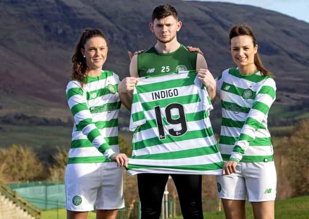 Flanked by Kelly Clark, left, and Cheryl McCulloch, Oliver Burke helps announce Indigo Unified Communications as the new shirt sponsor of the Celtic Womens team. Picture: SNS.