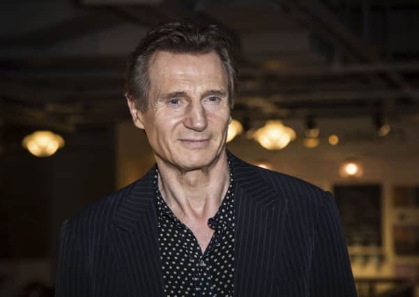 Liam Neeson has come under fire after admitting to walking the streets looking to kill a black person in revenge for the rape of someone he knew. Picture: Vianney Le Caer/Invision/AP