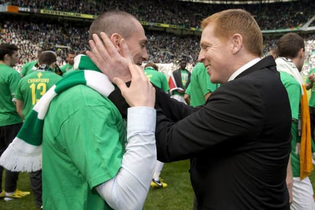 Manager Neil Lennon celebrates with Scott Brown after Celtic had secured the Premiership title with a 4-1 win over Inverness Caley Thistle in 2013. Picture: SNS