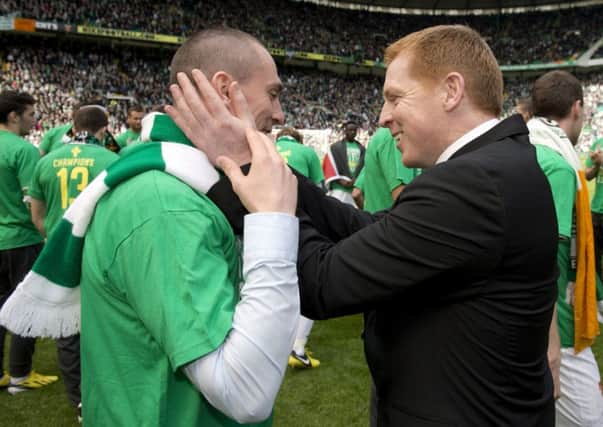 Manager Neil Lennon celebrates with Scott Brown after Celtic had secured the Premiership title with a 4-1 win over Inverness Caley Thistle in 2013. Picture: SNS