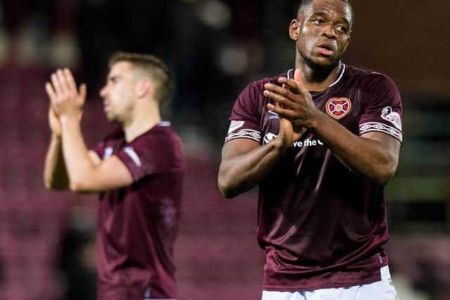Uche Ikpeazu applauds the fans after making his first appearance since October. Picture: SNS Group