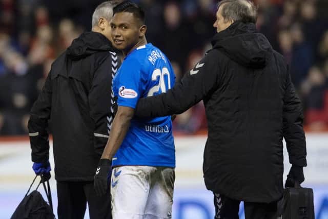 Alfredo Morelos walks off the pitch after receiving his third red card against Aberdeen this season. Picture: SNS Group