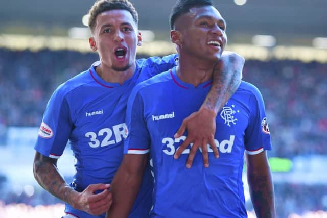 Alfredo Morelos, right, and James Tavernier. Picture: SNS