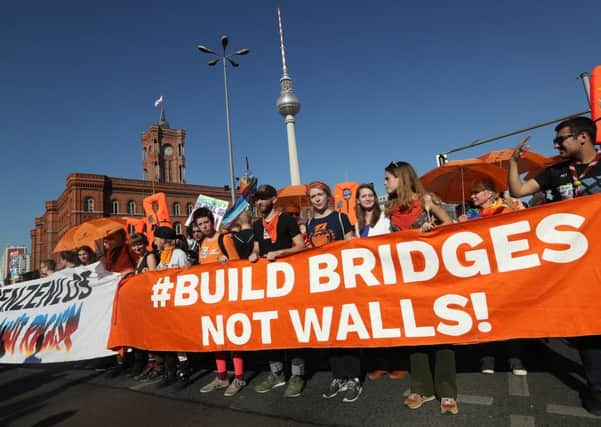 Protesters in Berlin call for an open society and decry increasing divisions in Europe  (Picture: Sean Gallup/Getty Images)