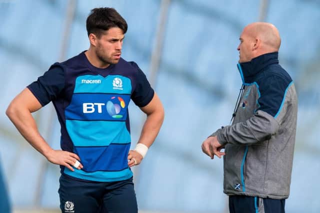 Gregor Townsend, right, talks to Sean Maitland during training. The Scotland head coach has picked the winger ahead of last weeks hat-trick hero Blair Kinghorn. Picture: Ross Parker/SNS