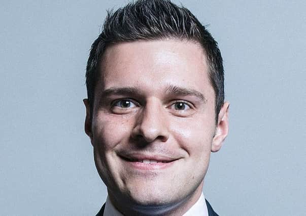 Ross Thomson.