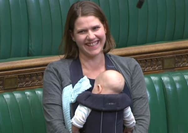 Liberal Democrat deputy leader Jo Swinson with her baby Gabriel in her Commons seat.