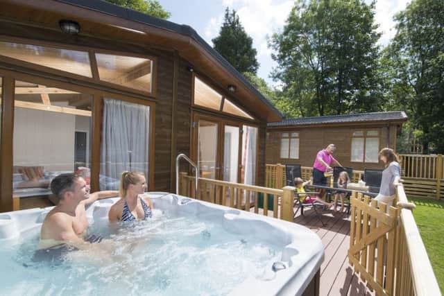 Tummel Valley near Pitlochry will receive an extra £158,000 to add hot tubs to existing riverside lodges. Picture: Contributed