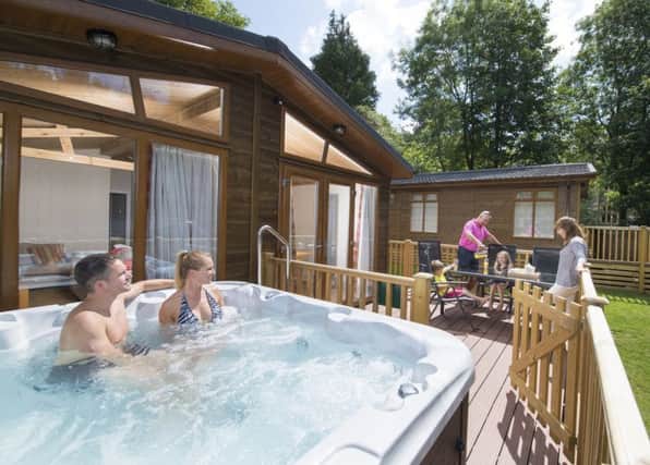 Tummel Valley near Pitlochry will receive an extra £158,000 to add hot tubs to existing riverside lodges. Picture: Contributed