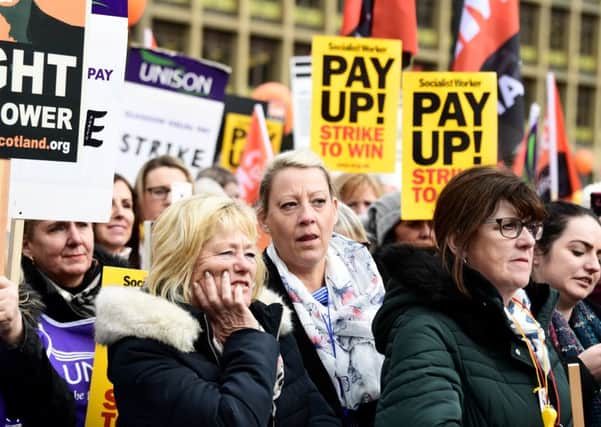 Council workers protest in Glasgow, where a £500m deal was struck last week. Picture: John Devlin