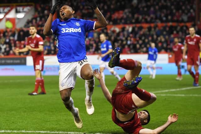 Alfredo Morelos and Scott McKenna were both sent off after tangling at Pittodrie. Pic: SNS/Craig Williamson