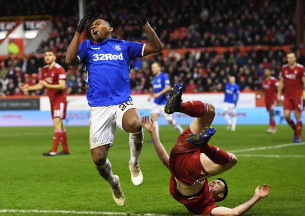 Alfredo Morelos and Scott McKenna were both sent off after tangling at Pittodrie. Pic: SNS/Craig Williamson