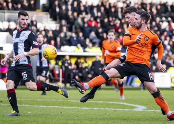 Dundee United's Nicky Clark doubles his side's lead. Pic: SNS/Roddy Scott