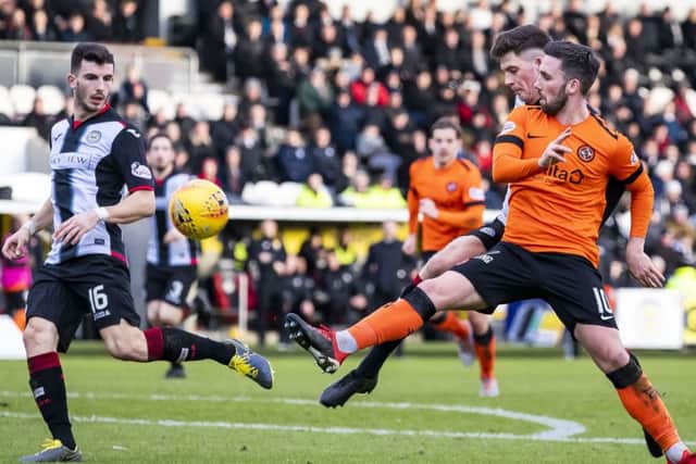 Dundee United's Nicky Clark doubles his side's lead. Pic: SNS/Roddy Scott