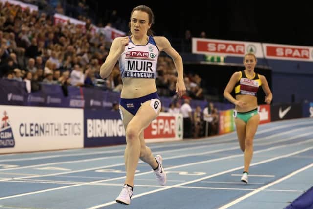 Laura Muir on her way to winning the Women's 3000m final. Pic: Martin Rickett/PA