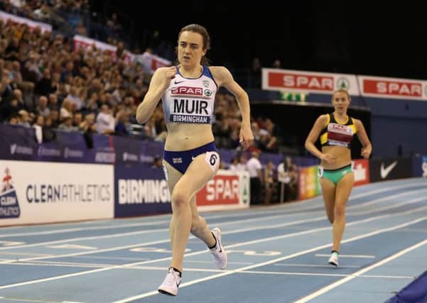 Laura Muir on her way to winning the Women's 3000m final. Pic: Martin Rickett/PA