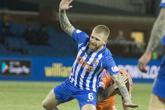 Kilmarnock's Alan Power clashes with Rangers' Ryan Jack. Picture: Jeff Holmes/PA Wire