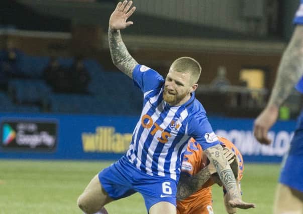 Kilmarnock's Alan Power clashes with Rangers' Ryan Jack. Picture: Jeff Holmes/PA Wire