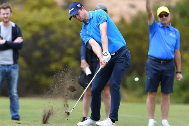 David Law hits an iron shot on his way to a closing six-under-par 66 in Australia. Picture: Getty Images