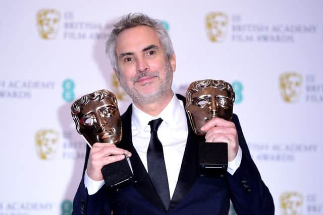 Alfonso Cuaron with his Best Film and Best Director Bafta's