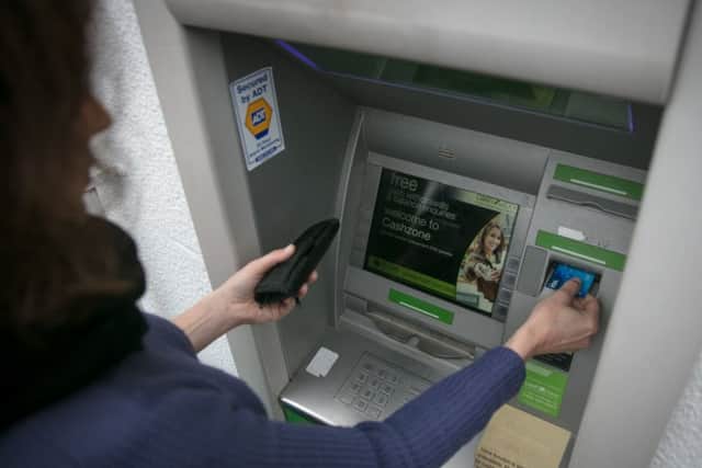 A total of 290 cash machines have been withdrawn from use north of the Border  in addition to 339 bank branches closing. Picture: Matt Cardy/Getty Images