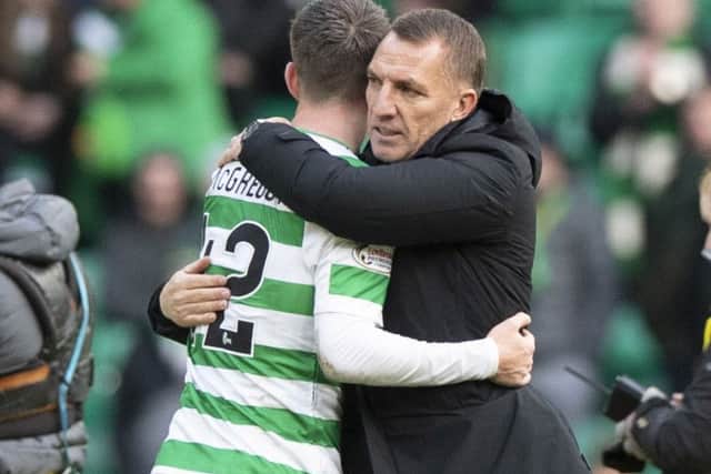 Brendan Rodgers and Callum McGregor at the final whistle after Celtic's 5-0 win over St Johnstone.