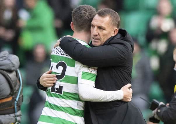 Brendan Rodgers and Callum McGregor at the final whistle after Celtic's 5-0 win over St Johnstone.