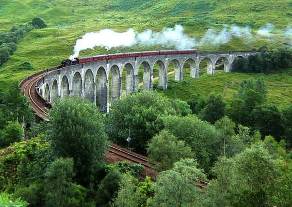 Thousands of people visit the Glenfinnan Viaduct hoping to see a steam train cross the bridge that features in the Harry Potter films. PIC: Creative Commons/Benutzer Nicolas 17.