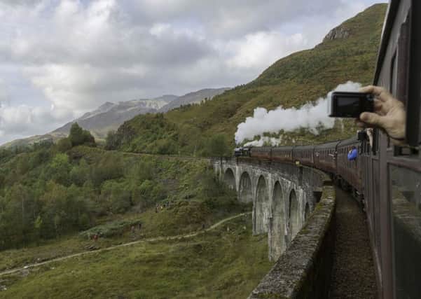 Tourists from all over the world visit the picturesque site made famous by the Hogwarts Express in the Harry Potter films.
Picture: Yui Mok/PA Wire