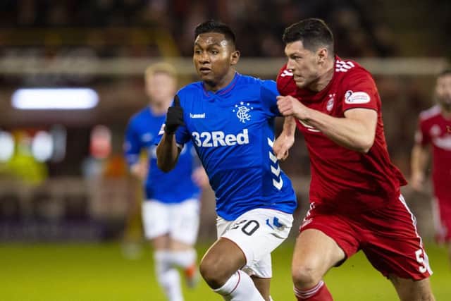 Alfredo Morelos of Rangers and Aberdeen's Scott McKenna battle for the ball during the Ladbrokes Premiership clash. Picture: SNS Group