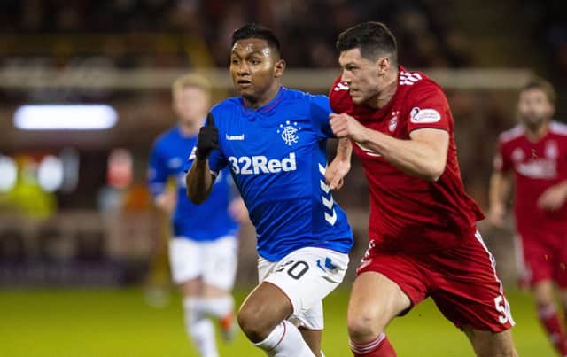 Alfredo Morelos of Rangers and Aberdeen's Scott McKenna battle for the ball during the Ladbrokes Premiership clash. Picture: SNS Group