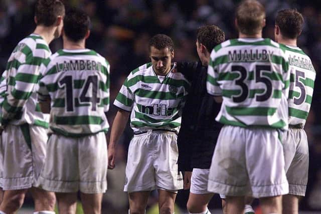Henrik Larsson, who had levelled the tie on aggregate for Celtic, cuts a dejected figure after missing a penalty during the shoot-out against Valencia. Picture: SNS.