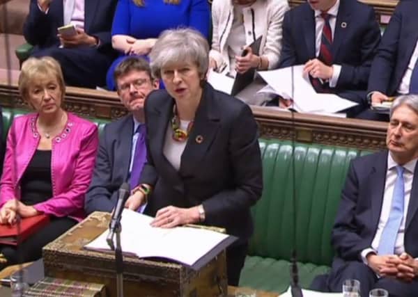 Theresa May gives gives a statement about progress on Brexit talks to MPs in the the House of Commons yesterday. She has appealed for more time to renegotiate her deal with Brussels. Picture: Getty