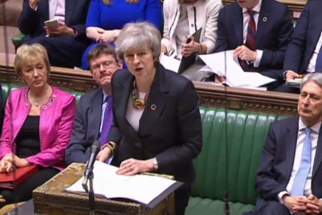 Theresa May gives gives a statement about progress on Brexit talks to MPs in the the House of Commons yesterday. She has appealed for more time to renegotiate her deal with Brussels. Picture: Getty